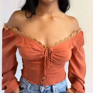 "Rhianna" Laced Smocked Top (rust) featuring long sleeves Size SMALL